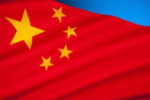 Flagge von China mit rotem Hintergrund und fünf gelben Sternen.